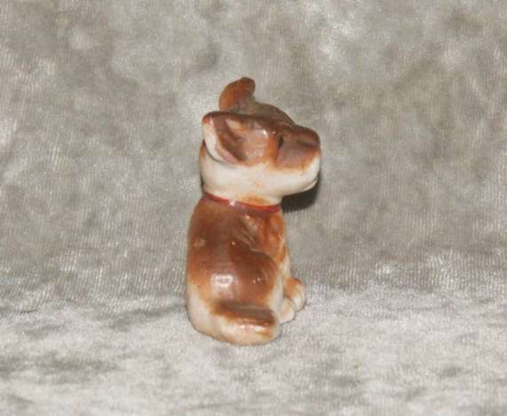 Vintage porcelain dog figurine