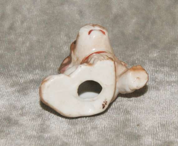 Vintage porcelain dog figurine