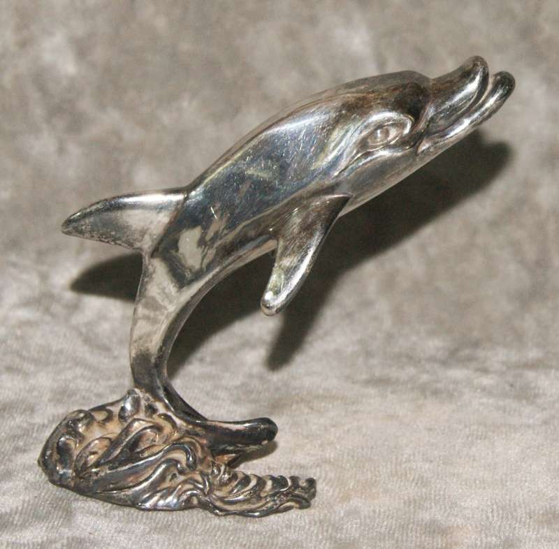 Vintage silver clad dolphin figurine
