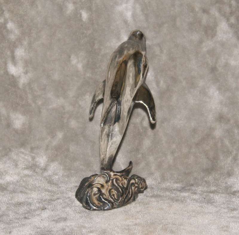 Vintage silver clad dolphin figurine
