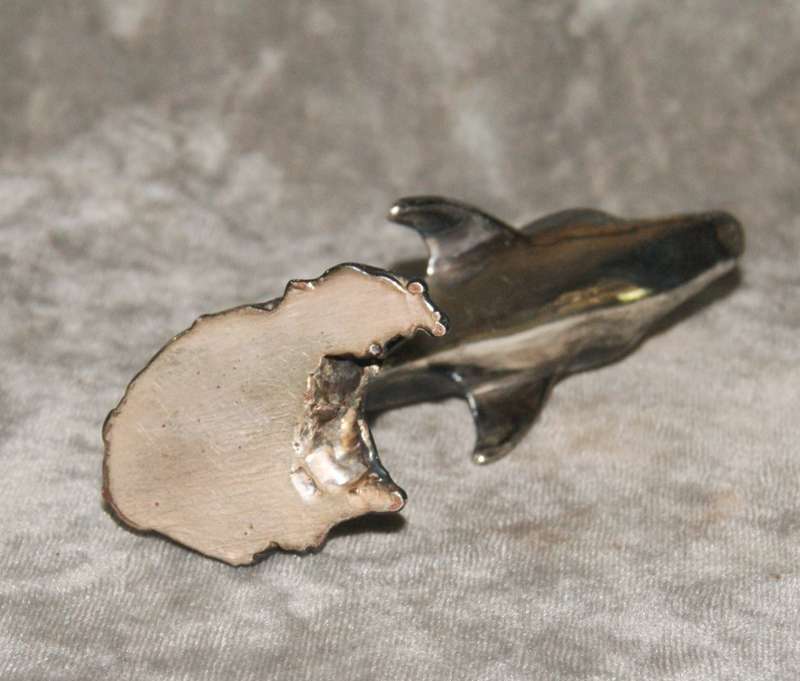 Vintage silver clad dolphin figurine