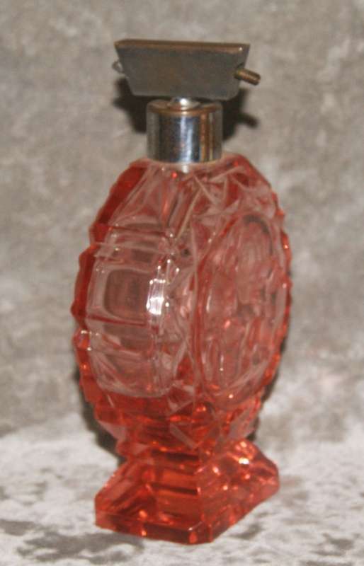 Art Deco hand cut pink glass perfume bottle with rose motif