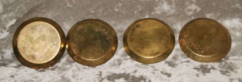 Set of 4 enameled brass coasters featuring African animals