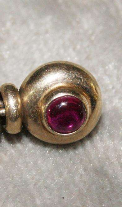 Pair of 9ct gold and ruby Cabochon earring with butterflies (3.8g)