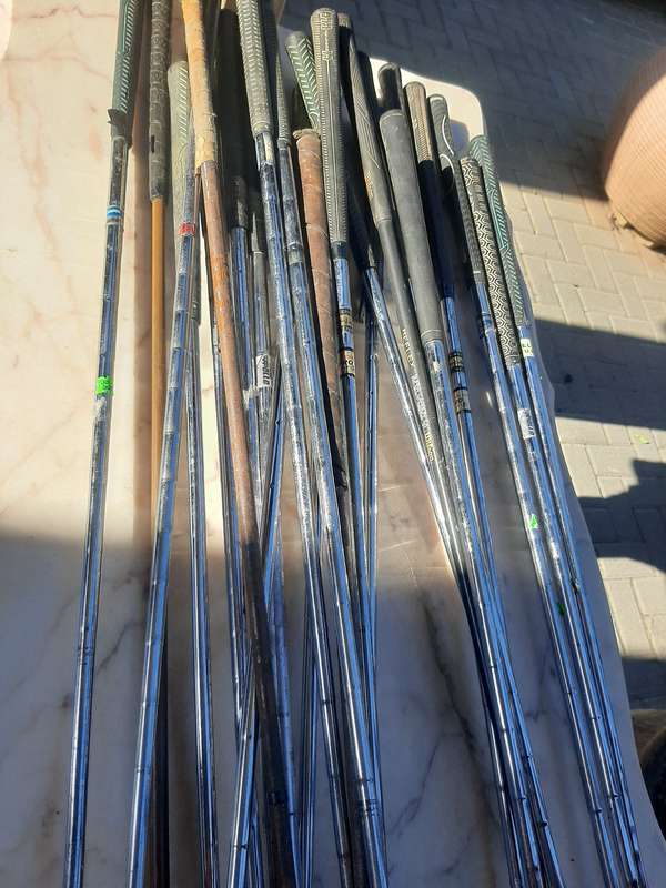 Assorted golf clubs