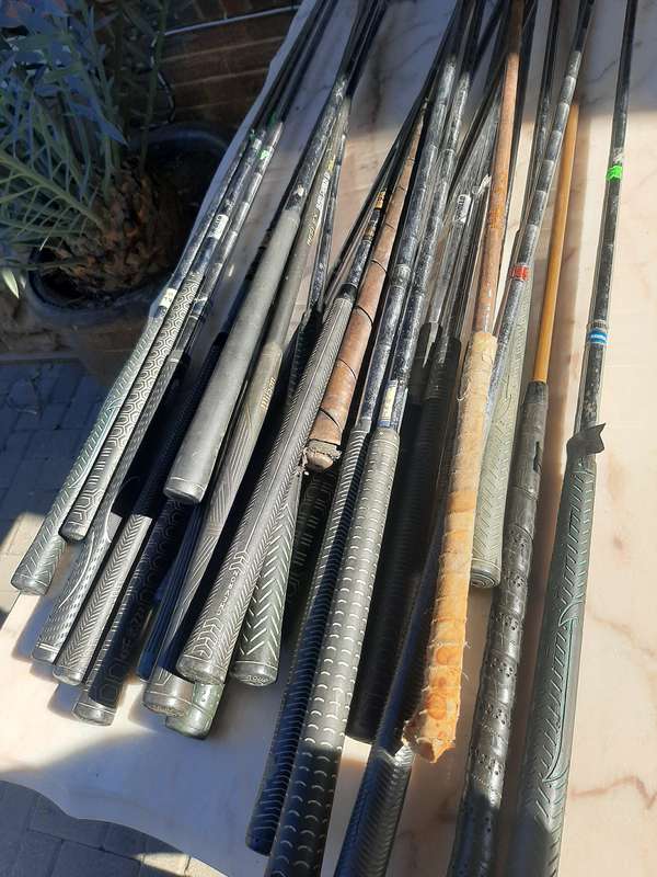 Assorted golf clubs