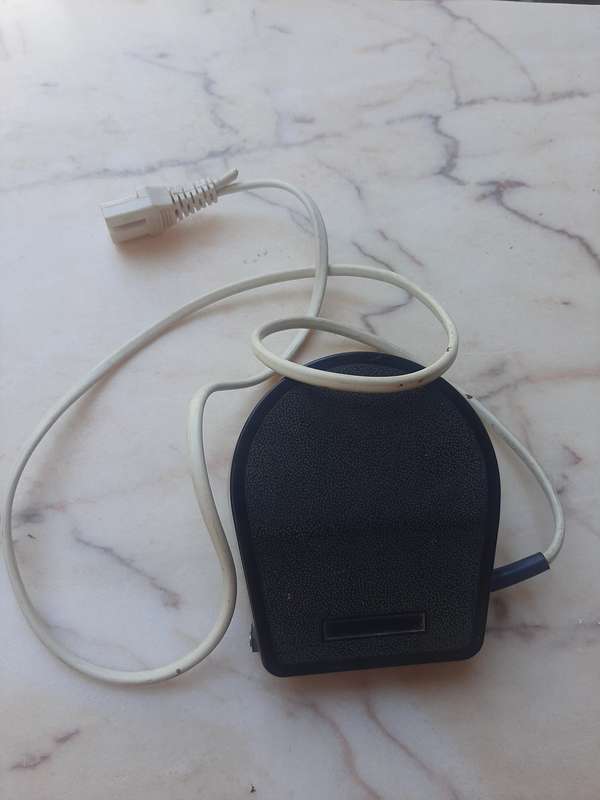 Sewing machine foot pedal