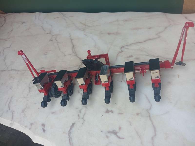 Die cast farm harvester