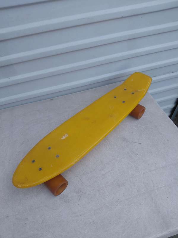 1970 yellow plastic skateboard