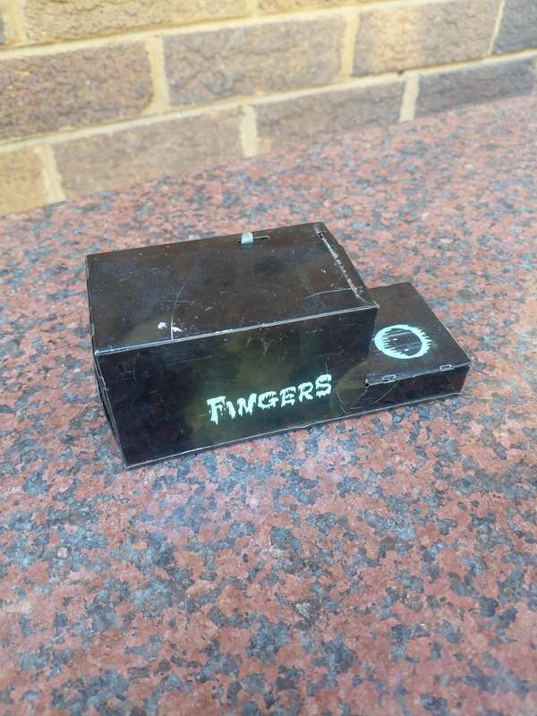 Vintage fingers 1960 tin toy