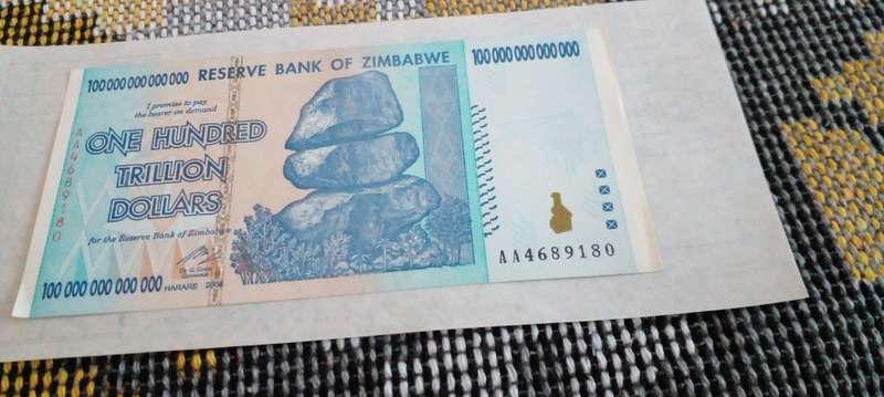 THE BIG ZIMBABWE 100 HUNDRED TRILLION DOLLARS.AUTHENTIC AA NOTE IN GREAT  CONDITION.
