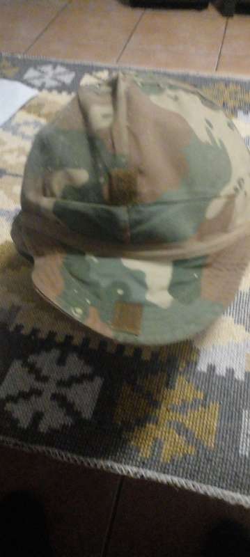 SADF PARABAT M 87 KEVLAR USED HELMET.INNER ,STRAP AND CAMO HELMET COVER INTACT. DESC.