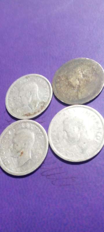 1950, 1941, 1946 and a 1933 SILVER SIXPENCE UNION OF SA COINS.