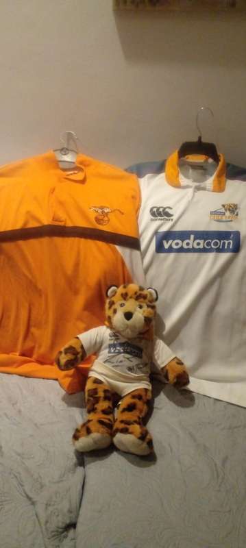RARE SIGNED CHEETAH RUGBY MEMORABILIA. GYSIE AND RUAN PIENAAR.FATHER AND SON RUGBY LEGENDS..
