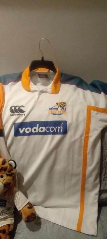 RARE SIGNED CHEETAH RUGBY MEMORABILIA. GYSIE AND RUAN PIENAAR.FATHER AND SON RUGBY LEGENDS..
