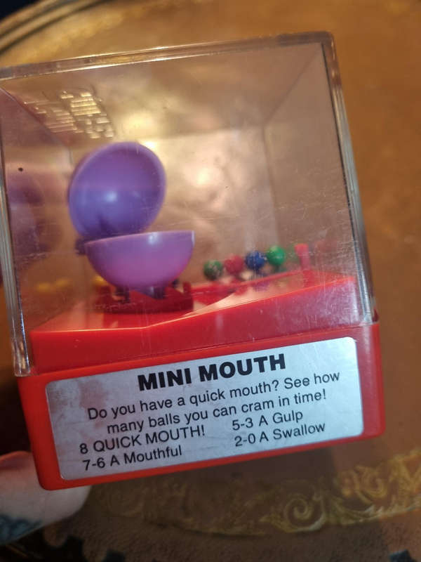 Silver 1980 TOMY Mini Mouth Wind-Up Toy by TOMY
