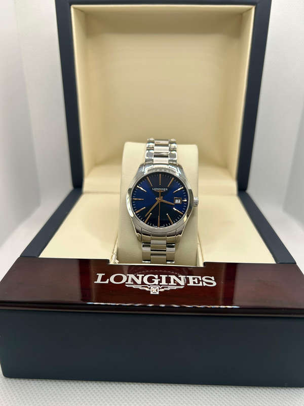 Longines Conquest Classic Ladies 34mm with box and papers in excellent condition