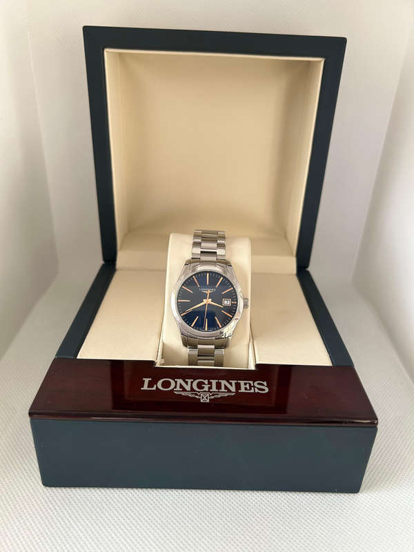 Longines Conquest Classic Ladies 34mm with box and papers in excellent condition