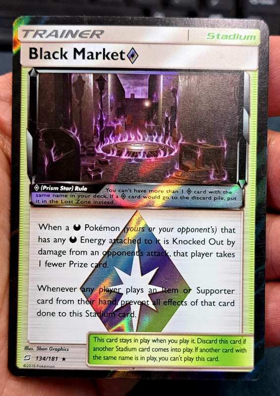 Pokemon Trading Cards -  Black Market Prism Star - 134/181 - Holo Rare - Team Up Singles - NM