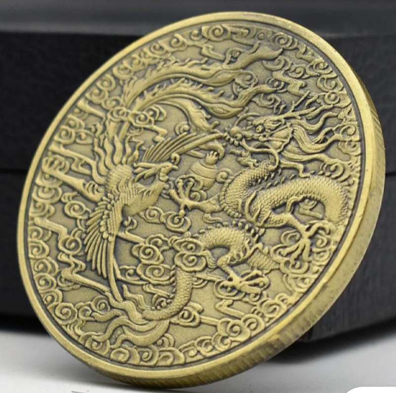 Dragon & Phoenix Commemorative Coin." Crown Size Coin "