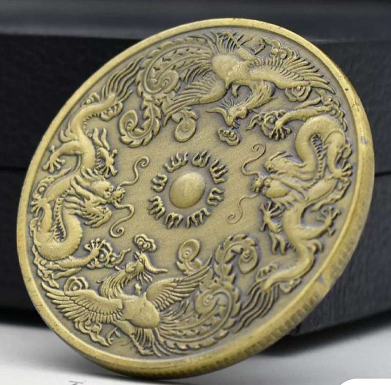 Dragon & Phoenix Commemorative Coin." Crown Size Coin "