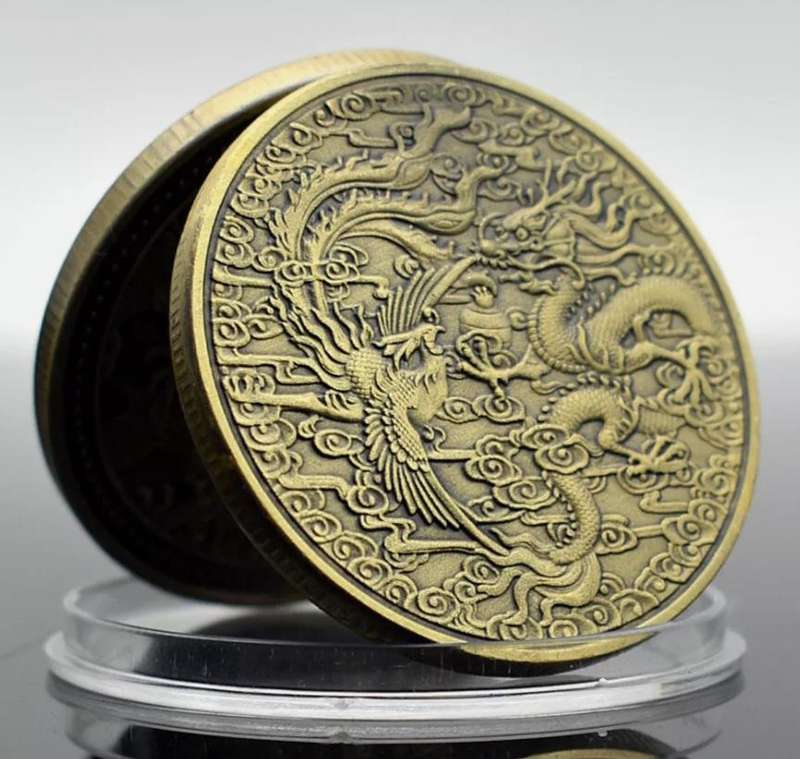 Dragon & Phoenix Commemorative Coin." Crown Size Coin "