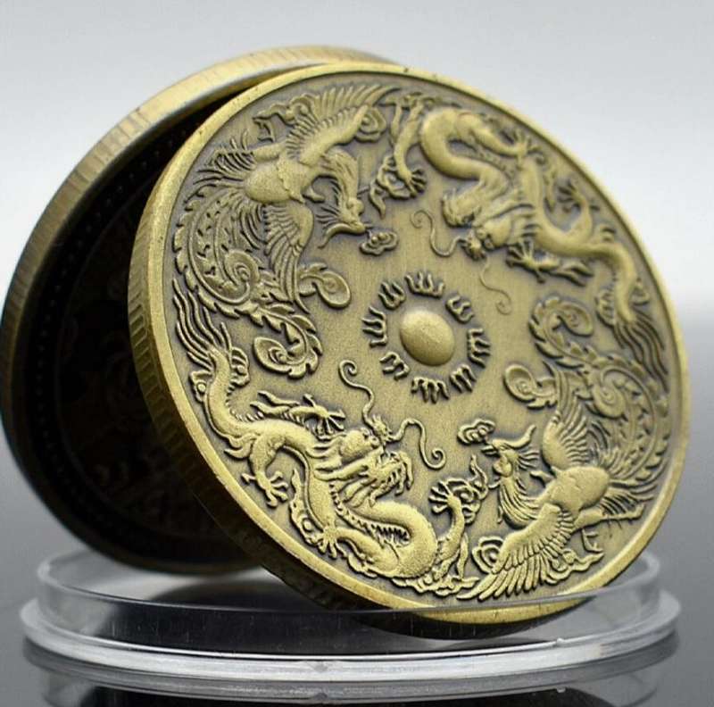 Dragon & Phoenix Commemorative Coin." Crown Size Coin "