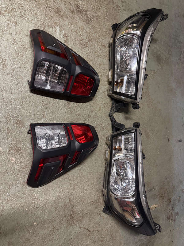 Original Toyota Headlamp and Taillamp set, with light protectors already fitted
