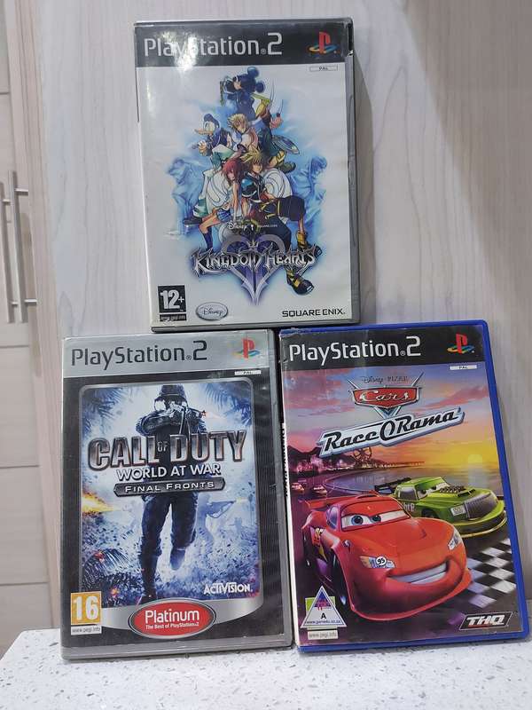 3 PLAYSTATION 2 GAMES FOR ONE BID KINGDOM HEARTS/CALL OF DUTY/CARS RACE O RAMA