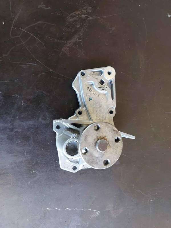 Used Ford Fiesta Water Pump P/N 7S7G-8501-A9A