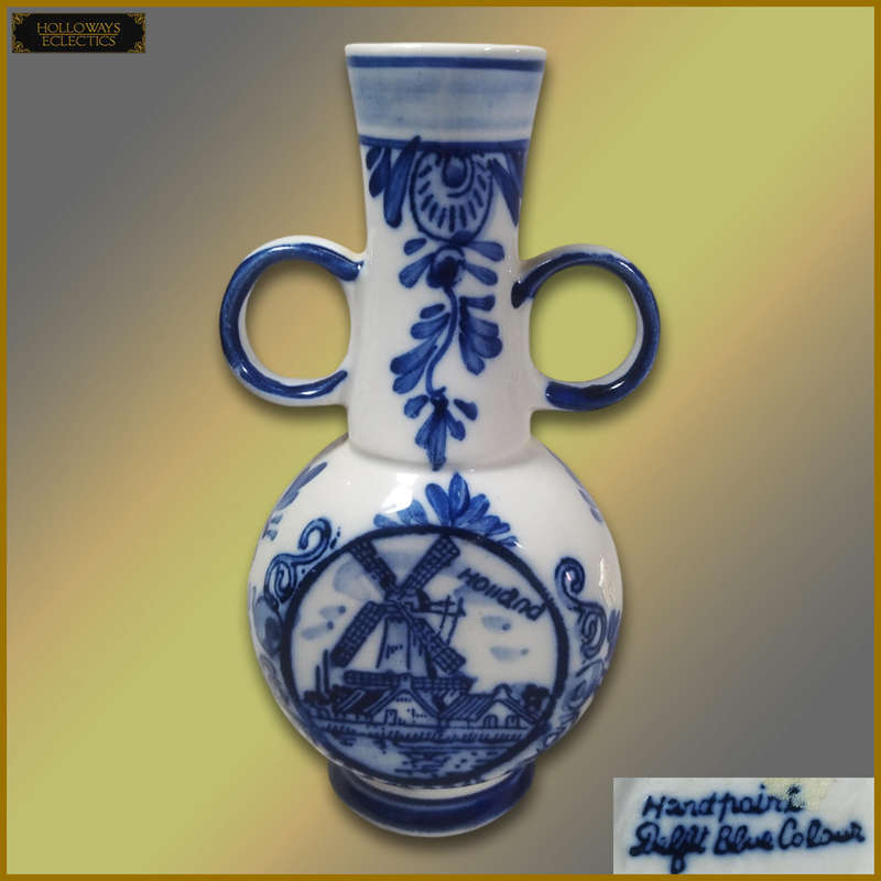 Delft Blue Vase And Plates