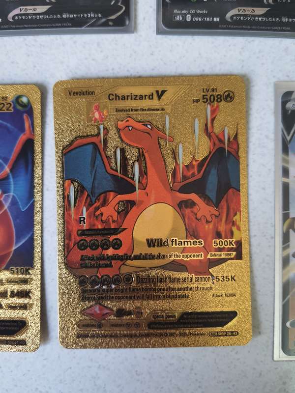 STUNNING COLLECTION OF POKEMON CARDS AND 24CT GOLD FOILD POKEMON NOTES