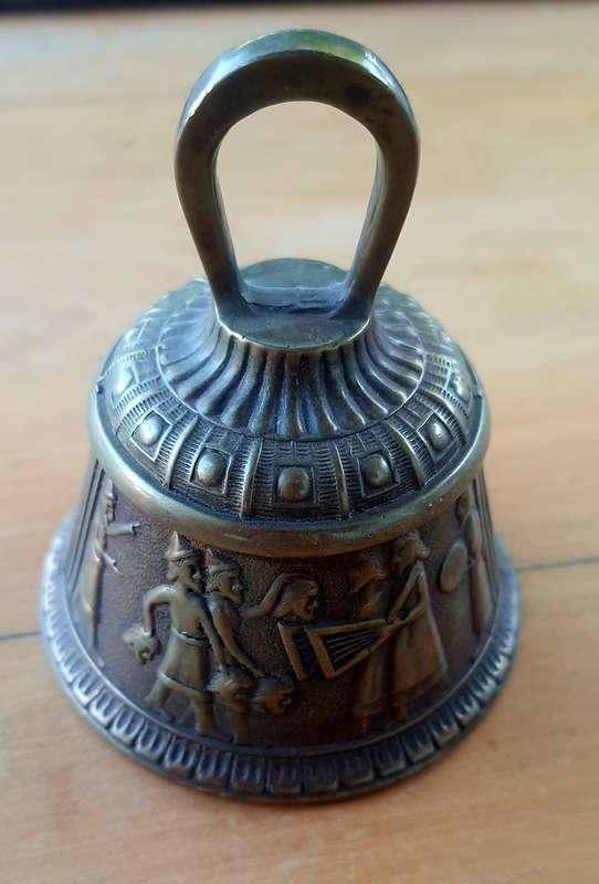 Solid brass bell - depicting the loss of head -Persian maybe???