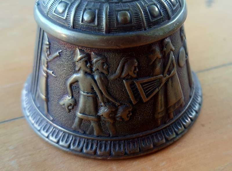 Solid brass bell - depicting the loss of head -Persian maybe???