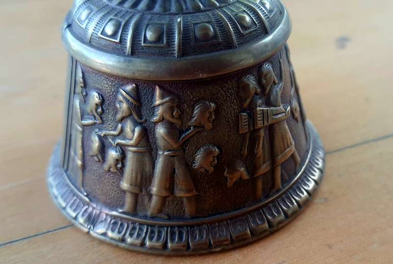Solid brass bell - depicting the loss of head -Persian maybe???