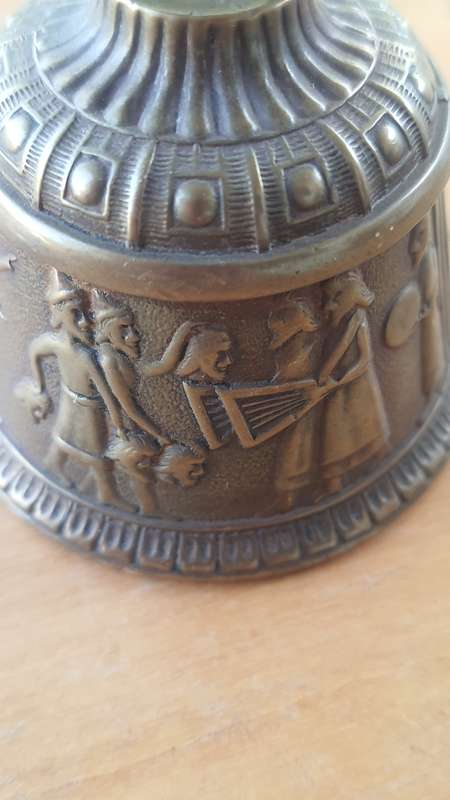 Solid brass bell - depicting the loss of head -Persian maybe???