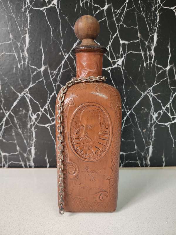 #3 VINTAGE MIQUEL DE CERVANTES LEATHER WRAPPED DECANTER (HAND MADE IN SPAIN)