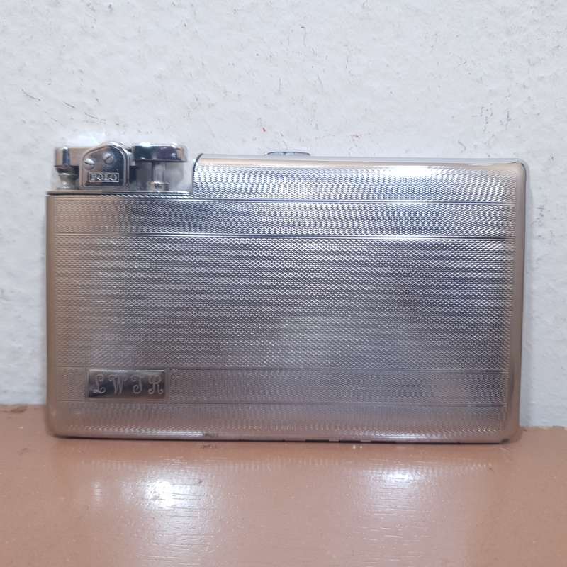 Authentic POLO - England Cigarette case with built in Automatic lighter set circa 1930 like new.