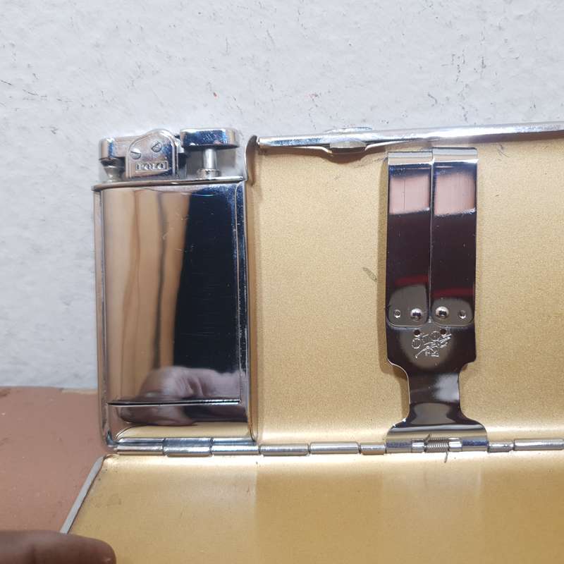 Authentic POLO - England Cigarette case with built in Automatic lighter set circa 1930 like new.