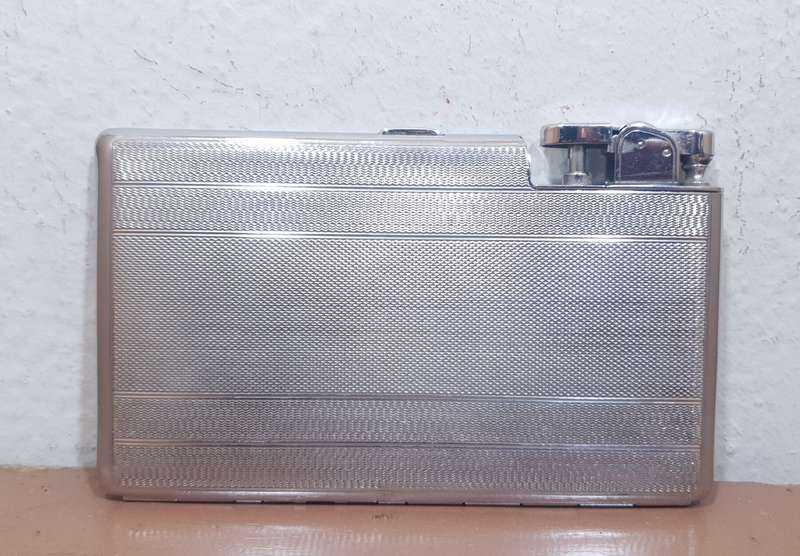 Authentic POLO - England Cigarette case with built in Automatic lighter set circa 1930 like new.