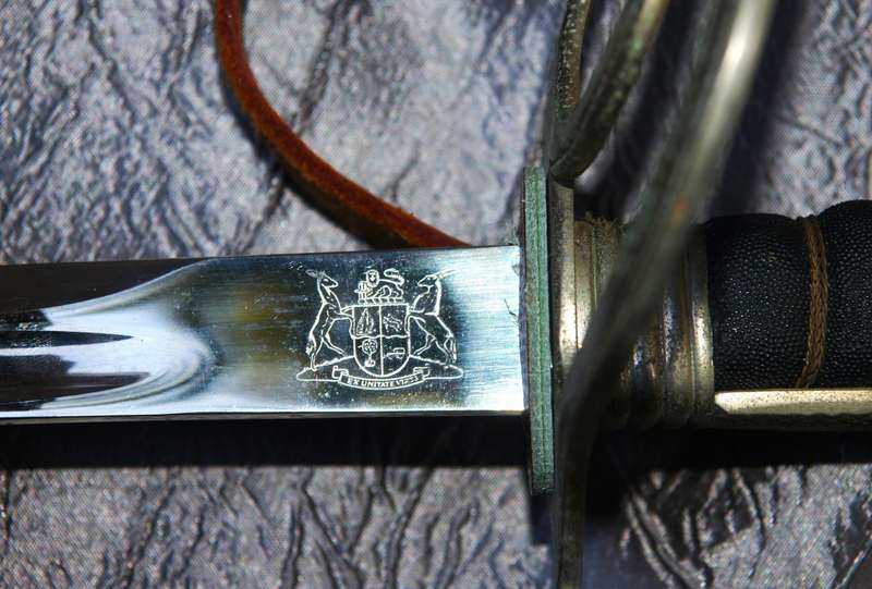 SAPS Officers Sword complete with Leather scabbard and attachment  in splendid condition