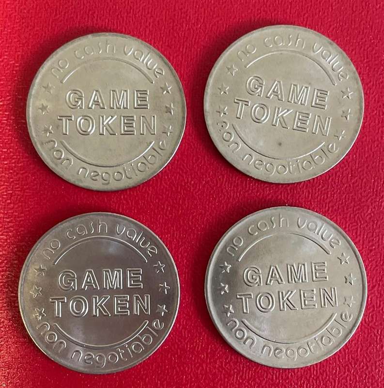 THE MAGIC GAME COMPANY 4 TOKENS