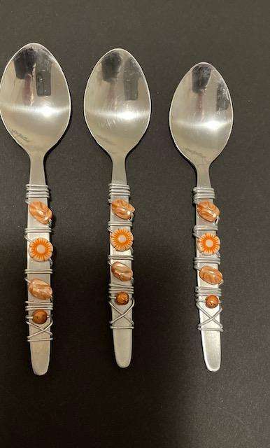 THREE BEAUTIFULLY DECORATED TEASPOONS - STAINLESS STEEL - CORAL COLOURS