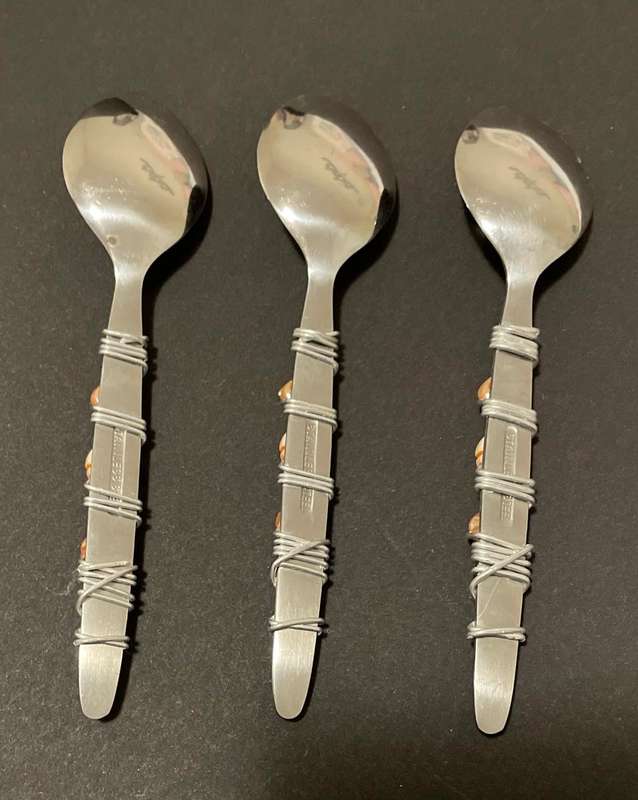THREE BEAUTIFULLY DECORATED TEASPOONS - STAINLESS STEEL - CORAL COLOURS