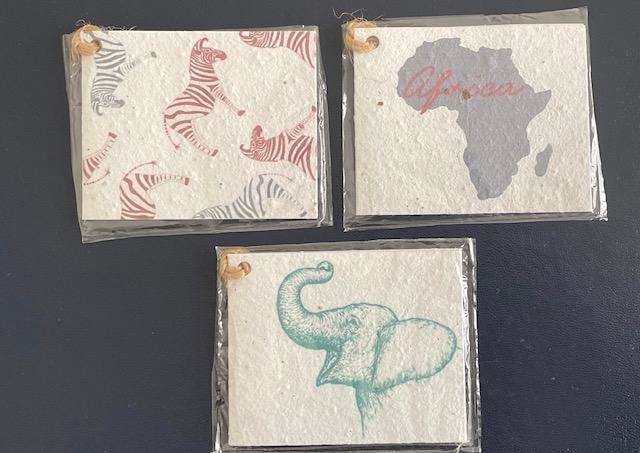 Three "magical" African gift tags. All embedded with flower seeds. Plant them after use!