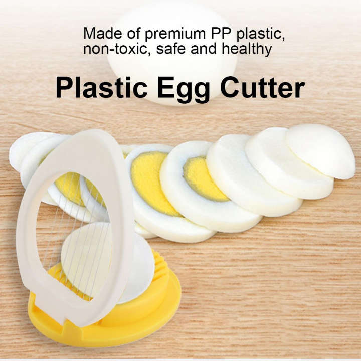 BURRAAQ TRANDING / MULTI-PURPOSE MANUAL STAINLESS STEEL EGG CUTTER