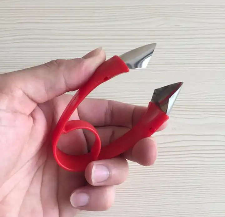 BURRAAQ TRANDING/ REMOVER ANV CORNER TWEEZERS PEELER