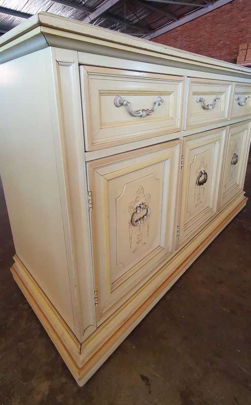Bernhardt inc French Provincial and Victorian style cabinet with Mable top on wheels.