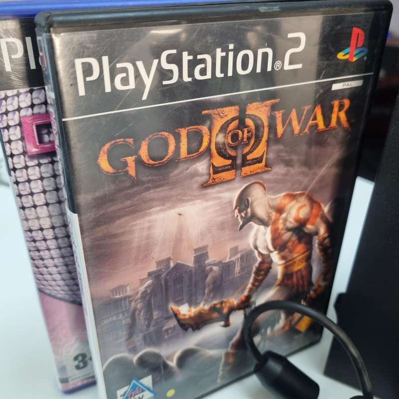 Play station 2 with 3 free games