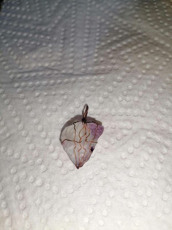 Clear light purple quartz pendant
